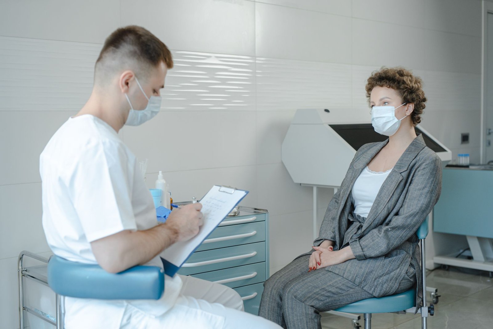 Doctor talking with a patient during a health checkup about chronic fatigue