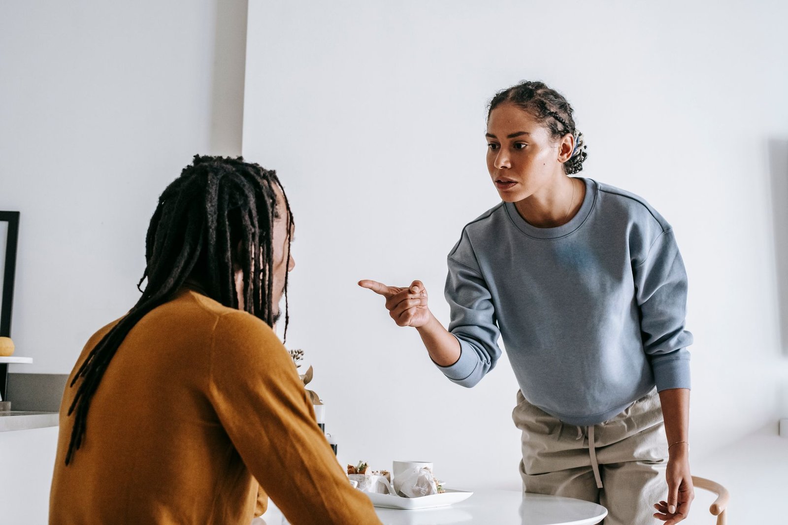 Two people having a calm, honest conversation about a personal boundary