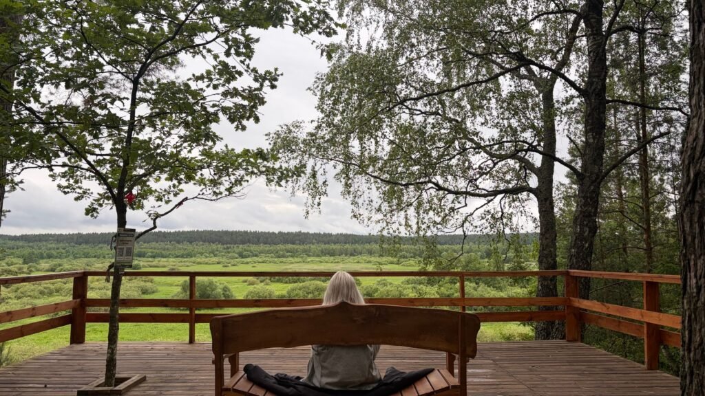 Woman sitting alone quietly reflecting on her emotions without shame