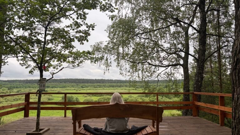 Woman sitting alone quietly reflecting on her emotions without shame